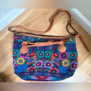 handmade Guatemalan huipil and leather tote bag